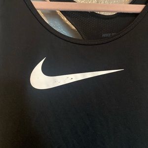 Nike tank. Little scraped on the Nike. 4$